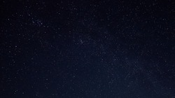 Starry night sky as a background. Dark interstellar space.