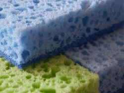 A few colorful sponges, a close-up shot.