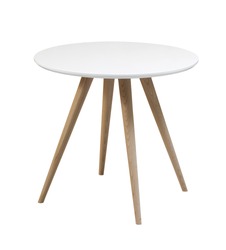 Furniture from 50-60 years of the last century.White round table with wooden legs on a white background