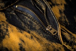 Close up of zipper of a slim fit jeans