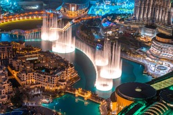 Dancing fountain show. Magical view at night. Tourist attraction. Luxury travel inspiration. 