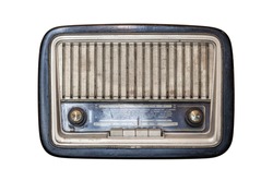 An old transistor radio, with knobs and buttons for manual tuning. Ancient object, worn and ruined by time. Isolated on white background. Antiques