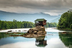 Small house on a stone on Drina river, near the Bajina Basta in Serbia