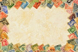 Postage vintage stamps - creative frame background of philately, collecting and studying the history of postage stamps. The systematized collection is of scientific, historical, and artistic interest.