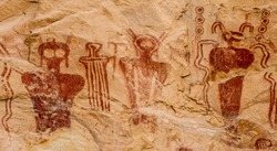 Ancestral Puebloan or Anasazi pictographs of strange anthropomorph figures, often referred to as 