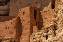 A close up on the windows and walls of Montezuma Castle National Monument, an ancient Sinagua cliff dwelling  in Camp Verde, Arizona, United States.