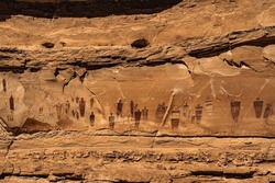 A panoramic view of the mysterious figures at The Great Gallery, a collection of ancient pictographs in Horseshoe Canyon, located within Canyonlands National Park, Utah.