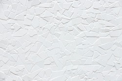 Abstract white stone wall background, Mosaic cracked texture pattern, Outdoor grey rough rocks wall, Can be used as background for display or montage your products.