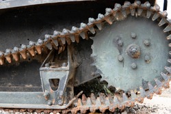 Old Bulldozer tracks and drive gear with sprocket construction machine, heavy industry
