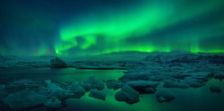 Aurora borealis above Jokulsarlon glacier lagoon, Iceland