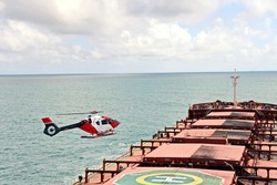 A helicopter used to receive a pilot on a sea vessel. Australia. December. 2019