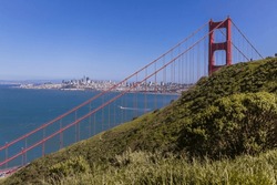Views from the top of a hill in San Francisco Bay and the city with the Golden Gate Bridge visible are breathtaking.