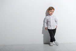 Little fashionable boy. Isolated on white background