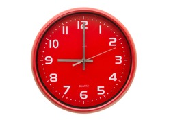 Red wall clock isolated on white background.