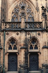 Front view of two twin medieval and gothc doors at the prague cathedral