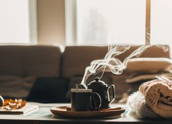 
the concept of enjoying coffee at home, spending time at home