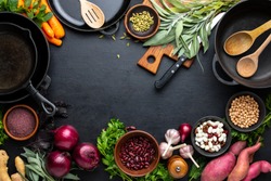 Culinary background with kitchen utensils and various culinary ingredients, healthy vegetarian protein sources, vegetables and spices for cooking healthy food