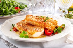 delicious fillets of grilled or oven baked pollock or coalfish served with a fresh salad
