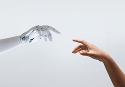 artificial intelligence, a robot hand and human hand touching each other, android concept of creation and intelligence