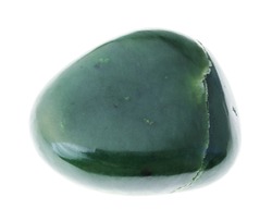 macro photography of natural mineral from geological collection - polished green Nephrite (Jade) gemstone on white background