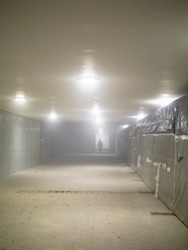 dusty repaired underground pass on cold winter night