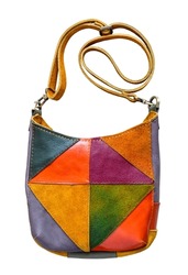 patchwork crossbody bag hand sewn from suede and leather cutout on white background
