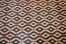 A fragment of a floor mosaic in the Florentine Baptistery of San Giovanni. Florence, Tuscany, Italy
