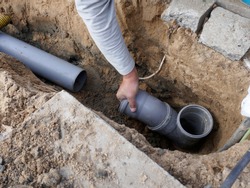 Laying and installation of a  sewer pipe