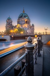 A boat passing by at the Berliner dom in Berlin Germany