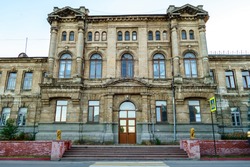 Facade of Romanov women's gymnasium in Kerch, Crimea. School was built in honor of Russian Tsar's family. Now it's one of most attractive old buildings in city
