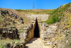 Entrance to antique crypt of Bosporan king or Royal Kurgan, Kerch, Crimea. Burial place was built about V BC. It has very unique construction in form of corbel arch