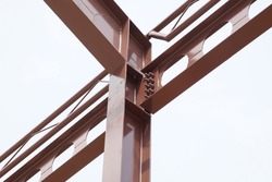 Structure steel beam, metal pillar installed for support preparing roof construction. Concept of structure steel, roofing, roof construction, girder, mounting, construction, skeleton.