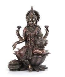 Bronze Laxmi Mata statue isolated over white with clipping path.