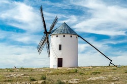 Typical windmill in Campo de Criptana, Spain, on Don Quixote Route, based on a literary character, it refers to the route followed by the protagonist of the novel Don Quixote de la Mancha by Cervantes