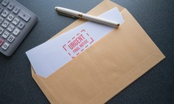 open envelope with a letter that says in red color: urgent final notice.