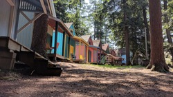 A colorful line of cabins