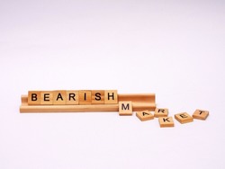 Bearish market word written in cubes isolated on white