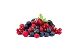 Ripe berries mixed assortment on white background. Summer berries sweet background.