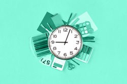 Monochromatic clock over office or school sets of stationery on pastel trendy green background. Flat lay copy space. back to school or creative education craft design concept and school start time.