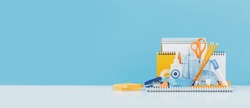 Group of office and school yellow and blue stationery on desk. Banner for back to school or education and craft concept. Selective focus. Copy space