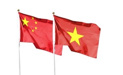 Chinese flag and Vietnam flag with clipping path isolated on white background. Close up of the waving flag. symbol. Frame with blank space for your text.