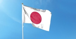 Japanese flag on cloudy sky. waving in the sky
