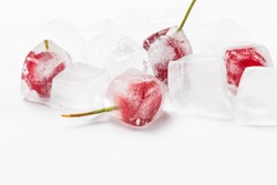Frozen cherries on a white background