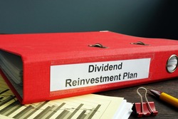 Dividend Reinvestment Plan DRIP in the red folder.