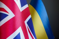 Close up of flags of Great Britain and Ukraine.