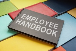 An employee handbook on the colorful books.