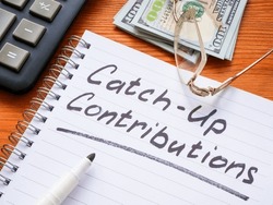 Catch-up contributions memo mark in notepad.