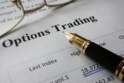 Page of newspaper with words options trading.