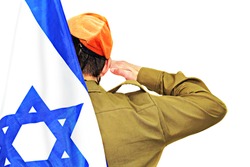 Israeli soldier salutes. Israel flag behind the back. White isolated background