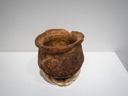 Jerico, Antioquia, Colombia - April 5 2022: Archaeological Ceramic Piece on a White Background in the Museum of Anthropology and Arts Exhibition